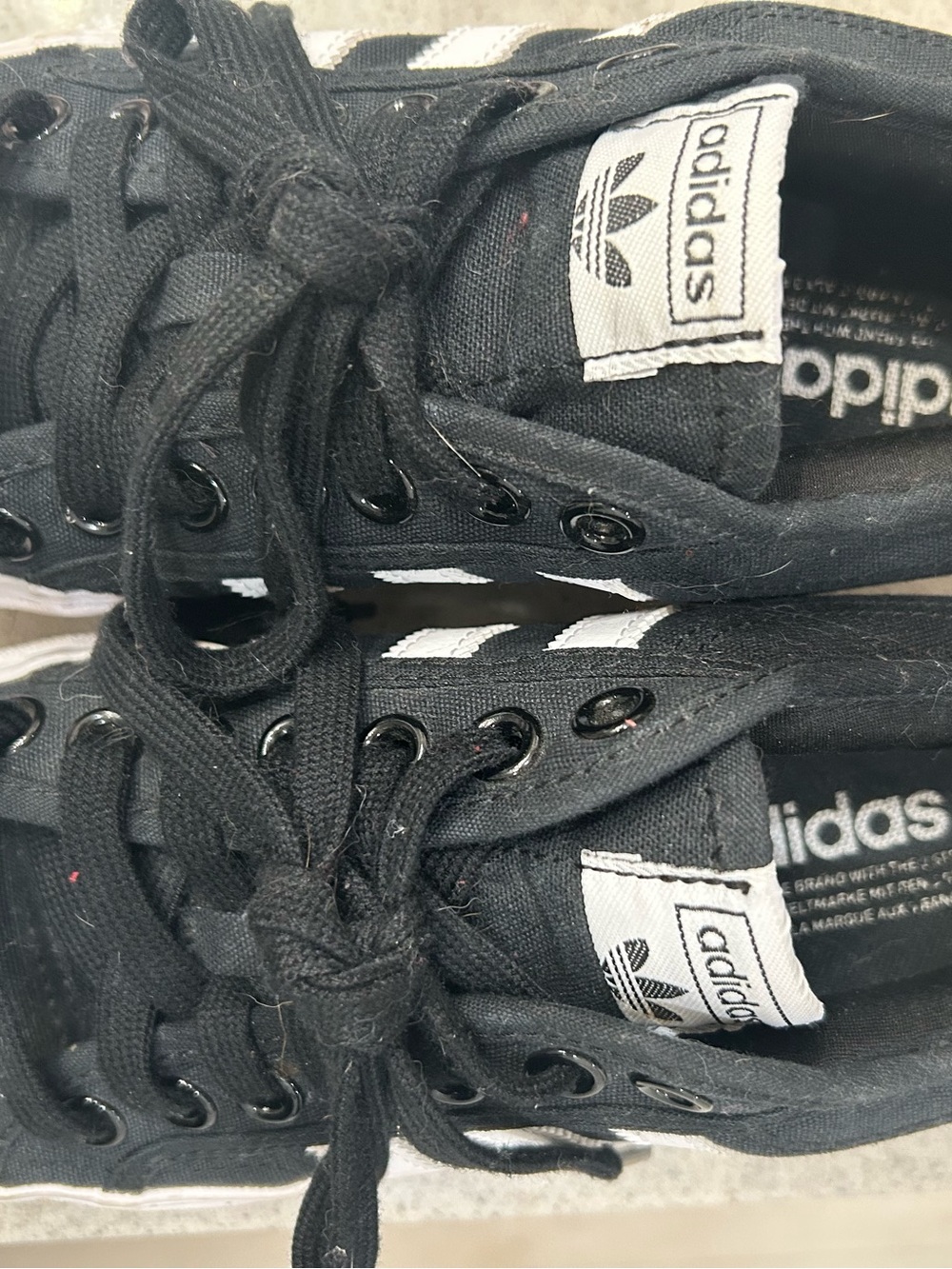 adidasBlack Sneakers with White Three Stripes